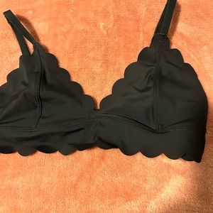 Scalloped black bra or lounge top with adjustable straps. Nylon & spandex. Small